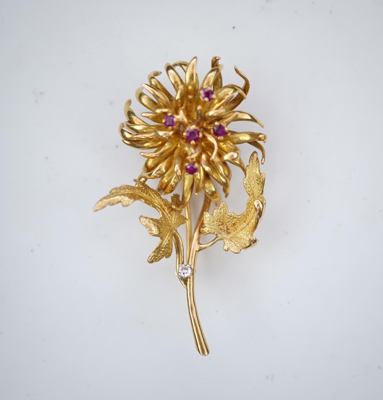 Ben Rosenfeld, a gold and ruby brooch, circa 1977